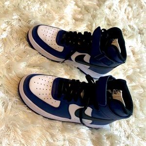 Im selling navy blue Nike high top Air Force ones